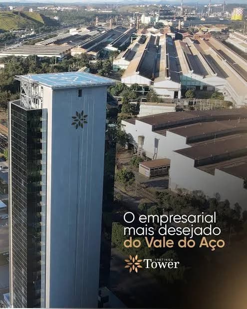 Prédio Ipatinga Tower visto do alto, com o parque industrial do Vale do Aço ao fundo